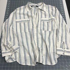 Women’s cream with blue stripes button up top.